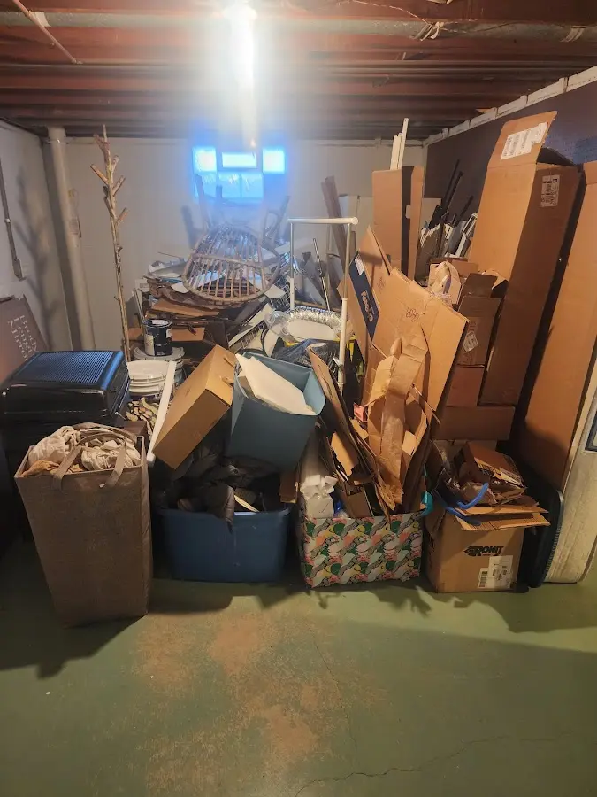 Roll-off dumpster container at job site for Yard Waste Dumpster Rental in Vinton